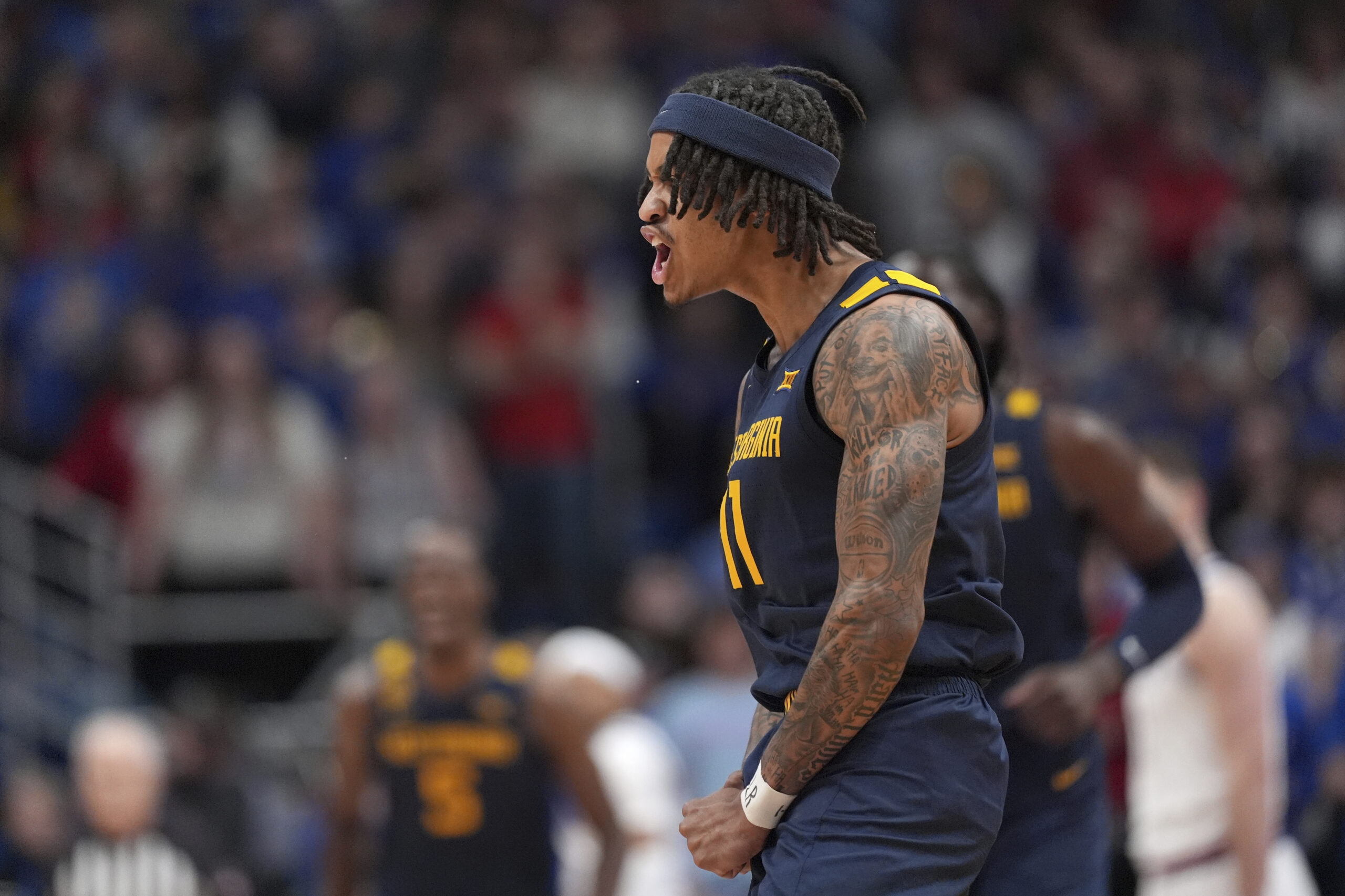 WVU feels fortunate last second no-call went its way against Kansas